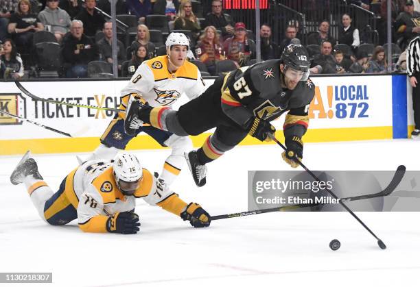 Max Pacioretty of the Vegas Golden Knights dives to take a shot as P.K. Subban of the Nashville Predators defends in the second period of their game...