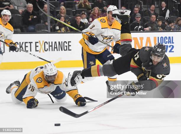 Max Pacioretty of the Vegas Golden Knights dives to take a shot as P.K. Subban of the Nashville Predators defends in the second period of their game...