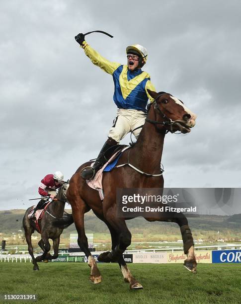 Cheltenham , United Kingdom - 13 March 2019; JJ Slevin celebrates as he crosses the finish line onboard Band Of Outlaws to win the Boodles Juvenile...