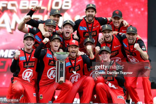 Renegades players celebrate after the Big Bash League Final match between the Melbourne Renegades and the Melbourne Stars at Marvel Stadium on...