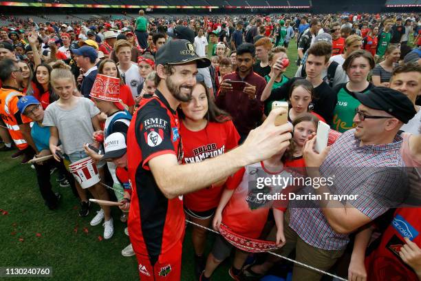 Kane Richardson of the Renegades celebrates with fans after the Big Bash League Final match between the Melbourne Renegades and the Melbourne Stars...