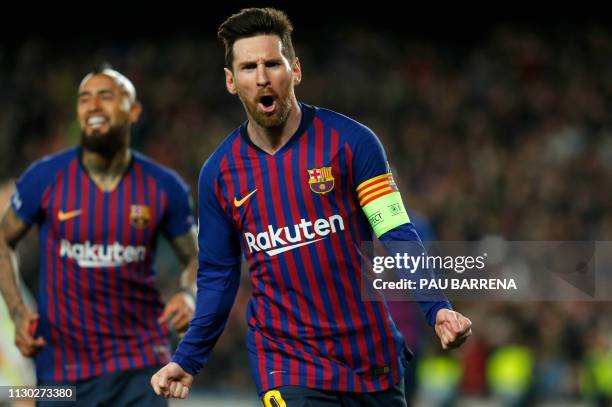 Barcelona's Argentinian forward Lionel Messi celebrates after scoring during the UEFA Champions League round of 16, second leg football match between...