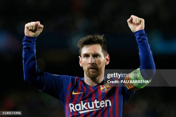 Barcelona's Argentinian forward Lionel Messi celebrates after scoring during the UEFA Champions League round of 16, second leg football match between...