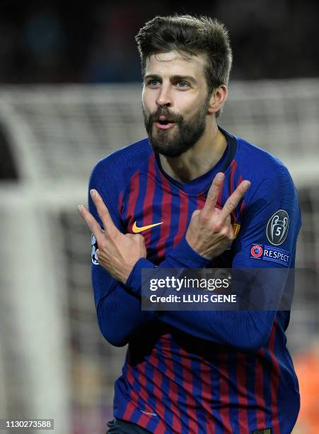 Barcelona's Spanish defender Gerard Pique celebrates his goal during the UEFA Champions League round of 16, second leg football match between FC...