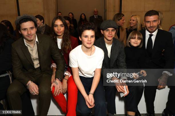 Brooklyn Beckham, Hana Cross, Cruz Beckham, Romeo Beckham, Harper Beckham and David Beckham attends the Victoria Beckham show during London Fashion...