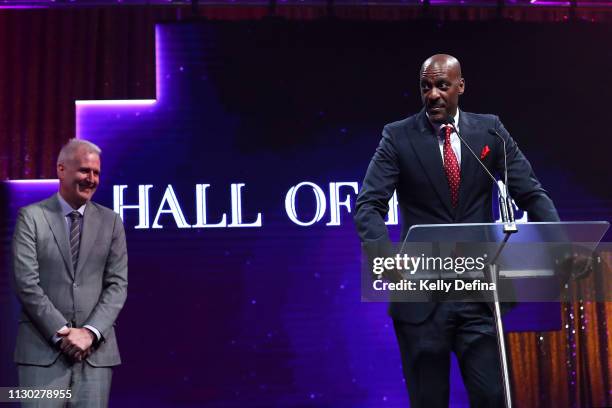 Lanard Copeland is inducted into the NBL Hall of Fame and Andrew Gaze looks on during the 2019 NBL Gala Dinner at Crown Palladium on February 17,...