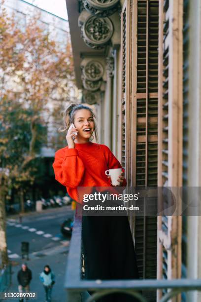 beautiful young girl in barcelona - red jumper stock pictures, royalty-free photos & images