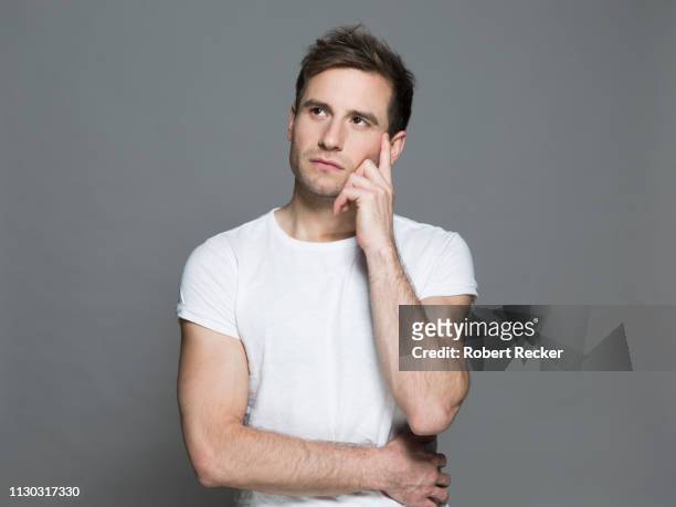 young man thinking - reflection stock pictures, royalty-free photos & images
