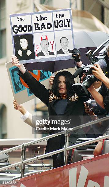 Singer Michael Jackson arrives for his demonstration outside Sony Music Entertainment Headquarters on July 6, 2002 in New York City. The...