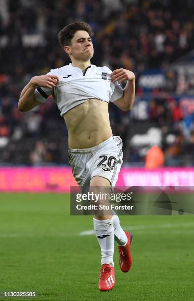 Swansea player Daniel James celebrates after scoring his goal during the FA Cup Fifth Round match between Swansea and Brentford at Liberty Stadium on...