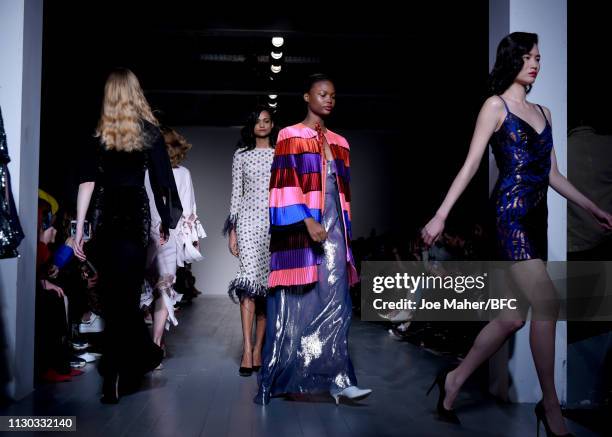 Models walk the runway at the Osman catwalk show during London Fashion Week Festival at the BFC Show Space on February 17, 2019 in London, England.