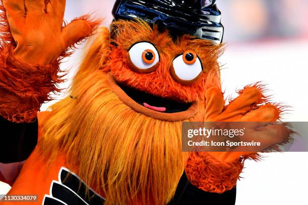 Flyers mascot Gritty waves to fans during the game between the Ottawa Senators and Philadelphia Flyers on March 11, 2019 at Wells Fargo Center in...