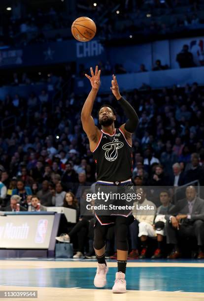 Dwyane Wade of the Miami Heat and Team LeBron throws an alley-oop against Team Giannis in the first quarter during the NBA All-Star game as part of...