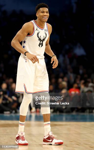 Giannis Antetokounmpo of the Milwaukee Bucks and Team Giannis reacts against Team LeBron in the first quarter during the NBA All-Star game as part of...