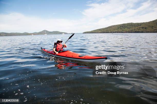 kayaking on wallis lake - kayaking australia stock pictures, royalty-free photos & images