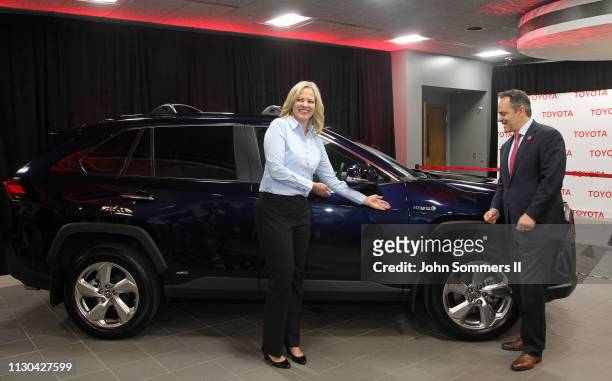 Toyota Motor Manufacturing Kentucky President Susan Elkington and Kentucky Governor Matt Bevin show off the 2019 Toyota RAV4 Hybrid at the Toyota...