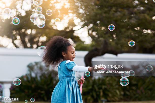 stay with me, little bubbles! - catching bubbles stock pictures, royalty-free photos & images