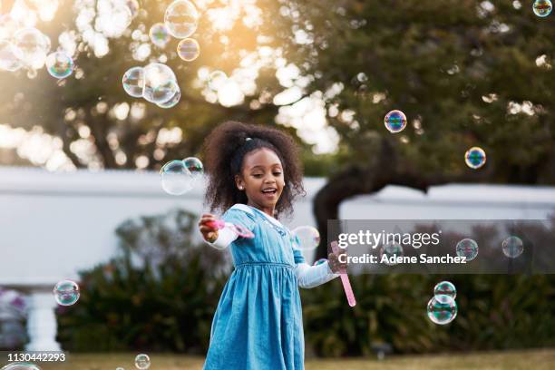 i blew so many bubbles! - catching bubbles stock pictures, royalty-free photos & images