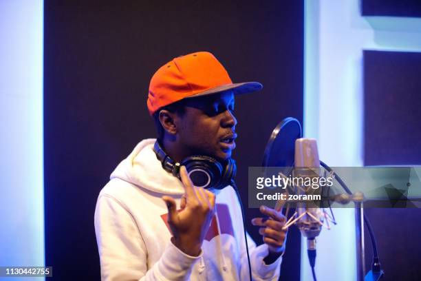musician in recording studio - rapper stock pictures, royalty-free photos & images