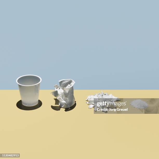 plastic cup in various states of deterioration - joghurtbecher stock-fotos und bilder