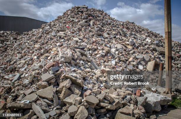 pile of demolition rubble - garbage pile stock pictures, royalty-free photos & images