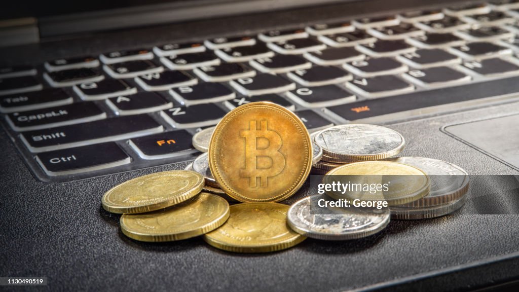 Bitcoin and laptop