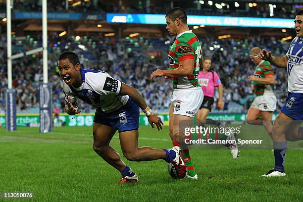 Ben Barba of the Bulldogs celebrates scoring a try during the round seven NRL match between the Canterbury Bulldogs and the South Sydney Rabbitohs at...