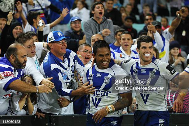 Ben Barba of the Bulldogs celebrates scoring a try with team mates during the round seven NRL match between the Canterbury Bulldogs and the South...
