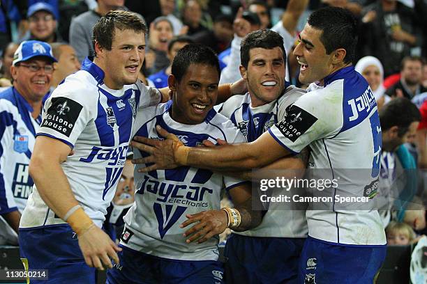 Ben Barba of the Bulldogs celebrates scoring a try with team mates during the round seven NRL match between the Canterbury Bulldogs and the South...