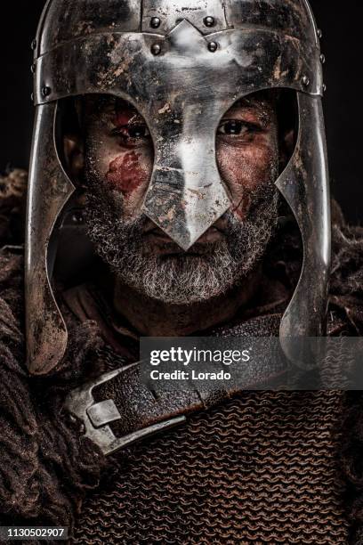 schwarze männliche wikinger - viking helmet stock-fotos und bilder