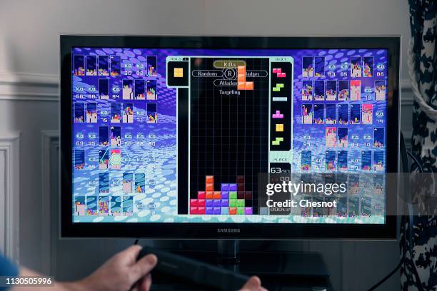 In this photo illustration a gamer plays the game Tetris 99 developed by Arika and published by Nintendo on February 18, 2019 in Paris, France. Last...