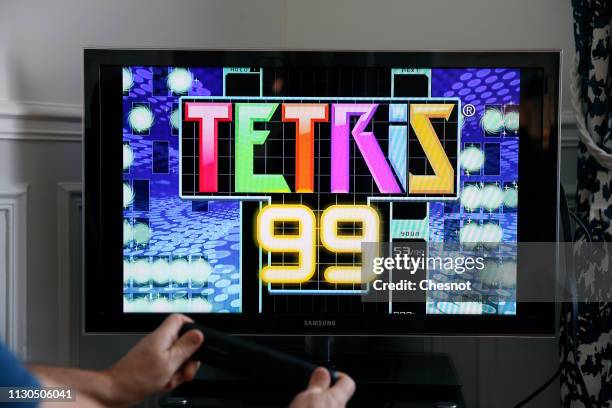 In this photo illustration a gamer plays the game Tetris 99 developed by Arika and published by Nintendo on February 18, 2019 in Paris, France. Last...