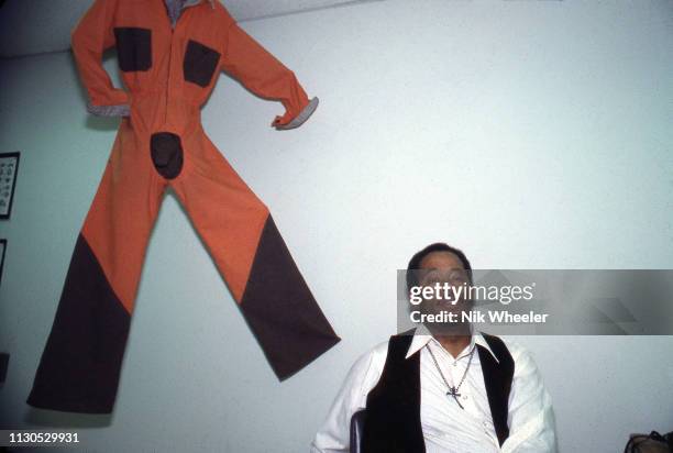 Former Black Panther Eldridge Cleaver with his designer menswear creations featuring trousers with a codpiece displayed in store in Los Angeles...