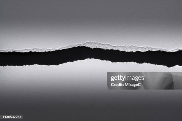 torn paper edge - black white colour stock pictures, royalty-free photos & images