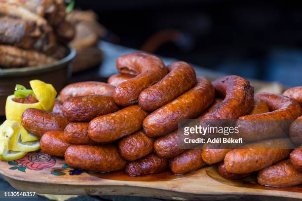 sausages at christmas market (hungary) - hungarian culture stock pictures, royalty-free photos & images