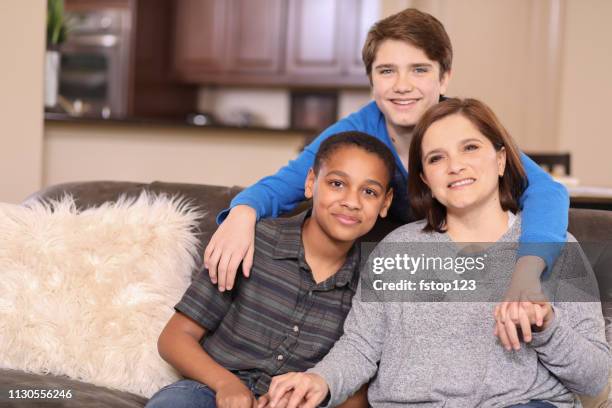 multi-ethnic, adoption or foster care family at home. - foster stock pictures, royalty-free photos & images