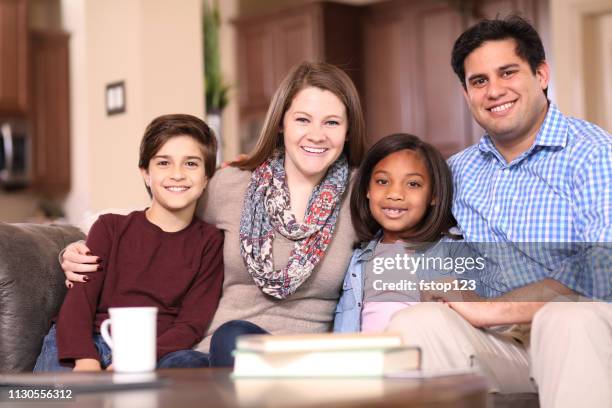 multi-ethnic, adoption or foster care family at home. - foster stock pictures, royalty-free photos & images