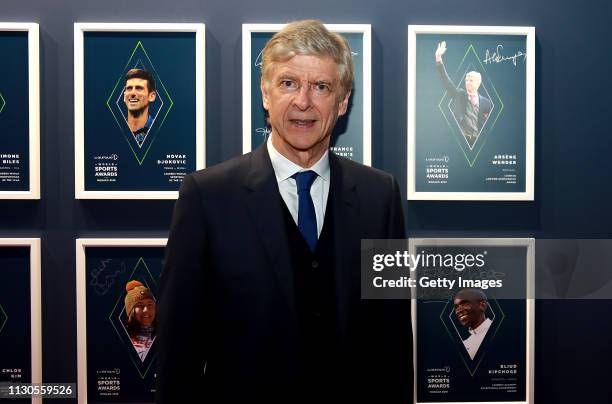 Arsene Wenger winner of the Laureus Lifetime Achievement award signs the wall during the 2019 Laureus World Sports Awards on February 18, 2019 in...