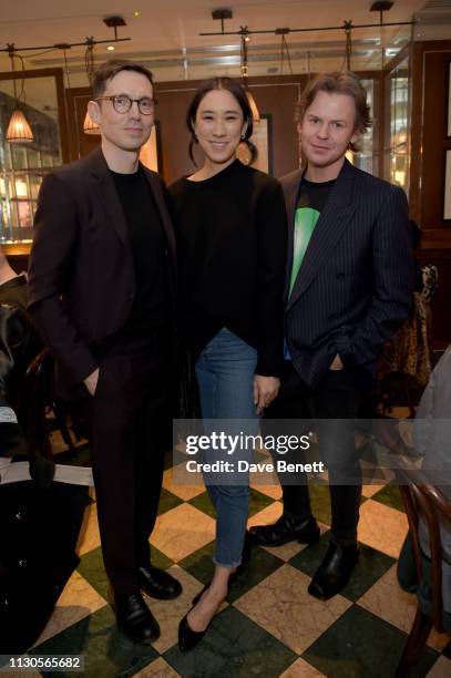 Designer Erdem Moralioglu, Eva Chen and designer Christopher Kane attend the official Erdem London Fashion Week dinner at J Sheekey Atlantic Bar on...