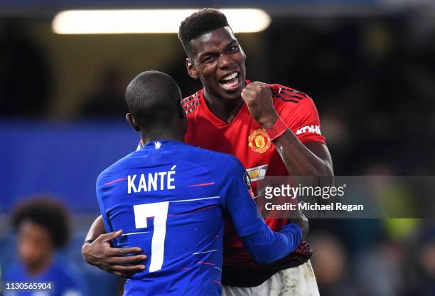 Paul Pogba of Manchester United jokes with N'golo Kante of Chelsea after the FA Cup Fifth Round match between Chelsea and Manchester United at...