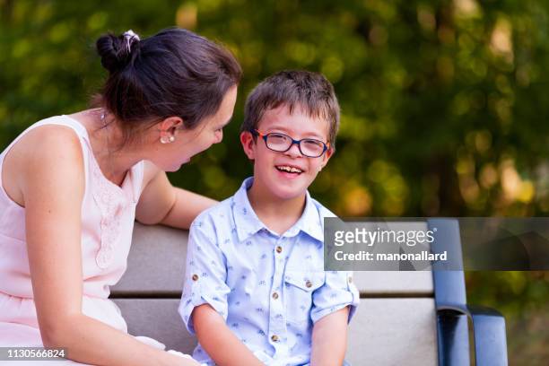 day in the life of family with four childs whom two are down's syndrome and autism - asperger syndrome stock pictures, royalty-free photos & images