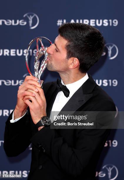 Navak Djokovic, winner of the Laureus World Sports Man of the Year 2019 poses with his award during the Laureus World Sports Awards on February 18,...