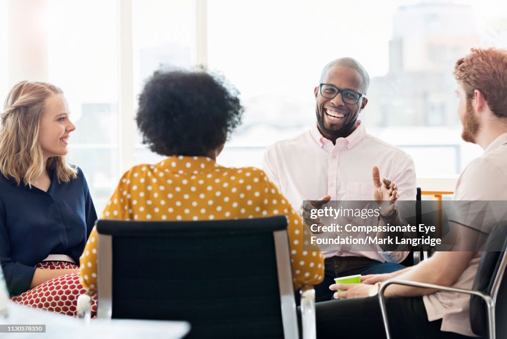 Business people having meeting in modern office