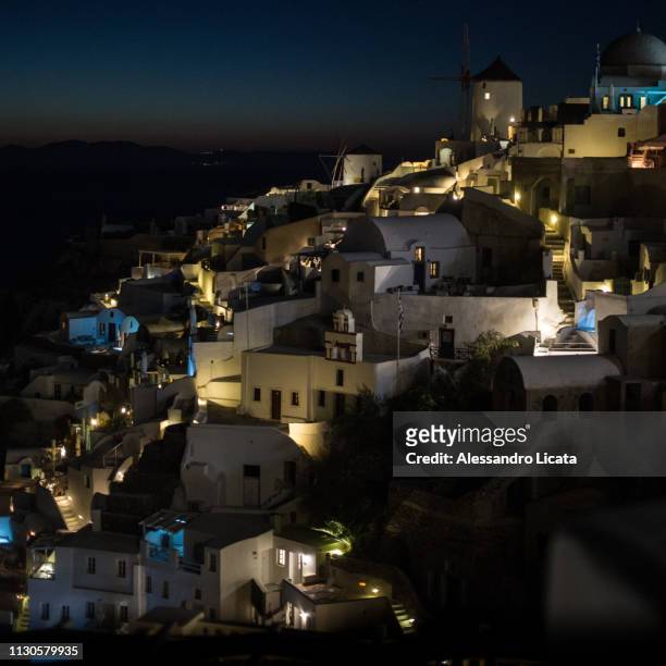 santorini at night - imbrunire stock pictures, royalty-free photos & images