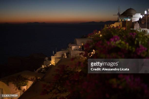 santorini at night - imbrunire stock pictures, royalty-free photos & images