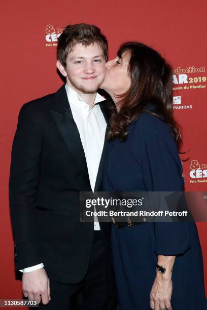 Actor Jean-Baptiste Marchais and Sylvie Pialat attend the "Diner des Producteurs - Producer's Dinner" Held at Four Season George V on February 18,...