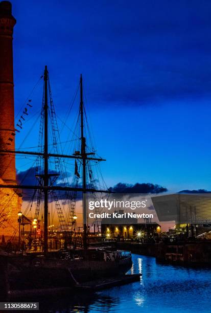 sunset over albert dock liverpool - liverpool uk stock pictures, royalty-free photos & images