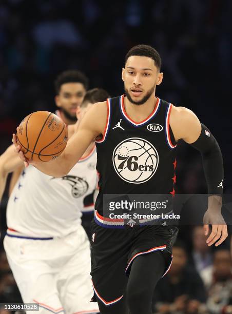 Ben Simmons of the Philadelphia 76ers and Team LeBron drives against Team Giannis during the NBA All-Star game as part of the 2019 NBA All-Star...