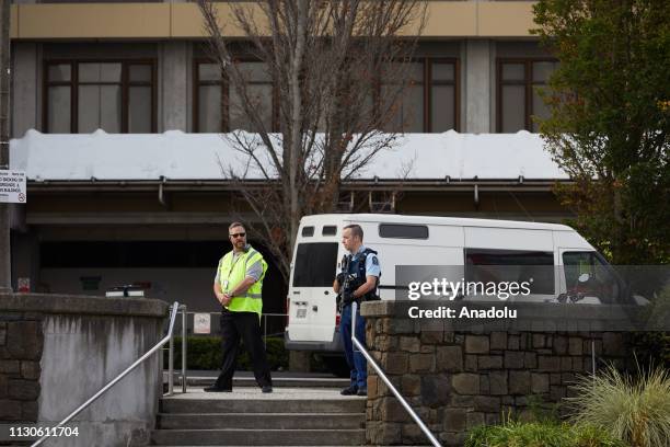 Police officers take security measures after gunmen attacked the two mosques and fired multiple times during Friday prayers in Christchurch, New...