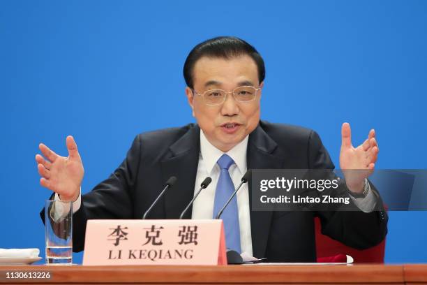 China's Premier Li Keqiang speaks during a news conference following the closing of the second session of the 13th National People's Congress at the...